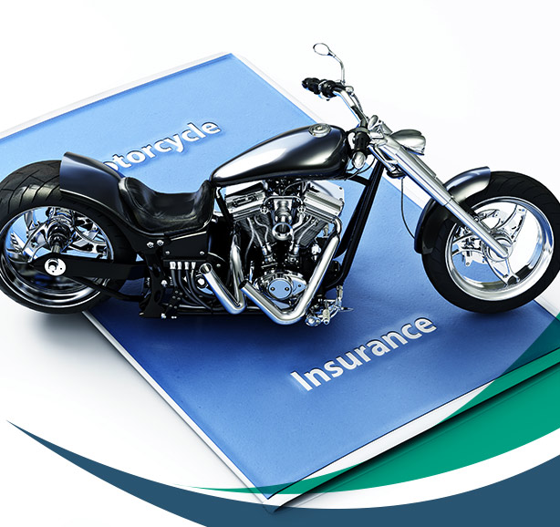 motorcycle-toy-on-top-of-a-motorcycle-insurance-policy-document-dartmouth-ma